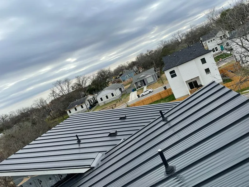 Standing seam metal roof panels with vents for Skylight Repair in Detroit Lakes